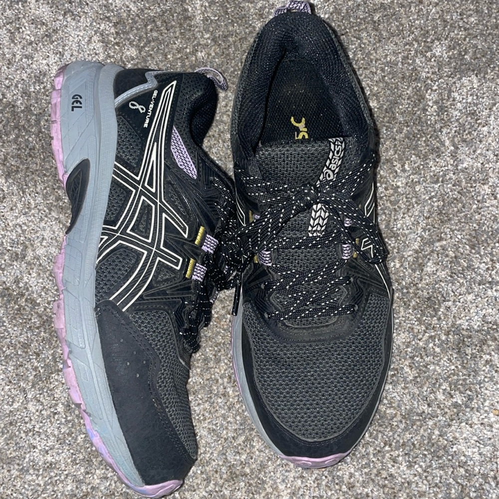ASICS all terrain sneakers.